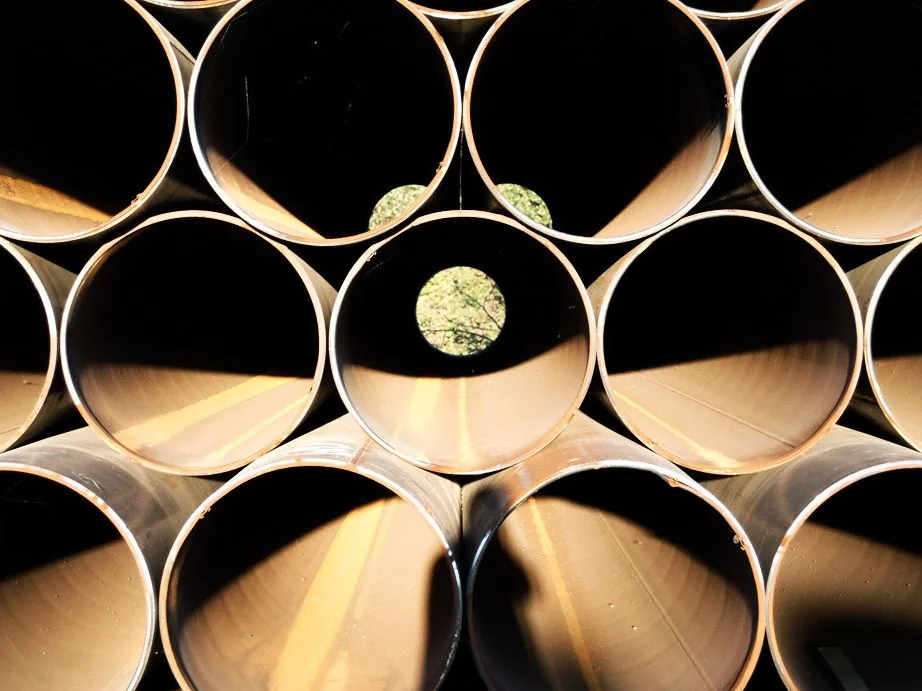 Stacked steel pipe seen end on
